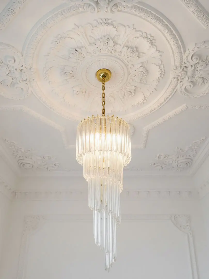 86 transparent spiral murano chandelier hanging in livingroom