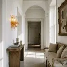 Murano amber felci sconces hanging in a hallway