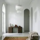 107 transparent Murano prism chandelier hanging in a hallway