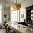 107 amber prism Murano chandelier hanging in a bar