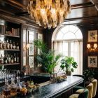 84 poliedri chandelier hanging in a bar