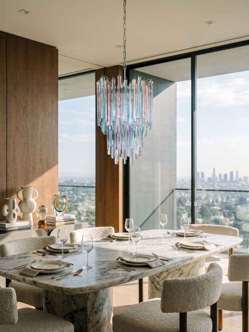 92 pink and blue Murano glass prisms hanging in a restaurant.