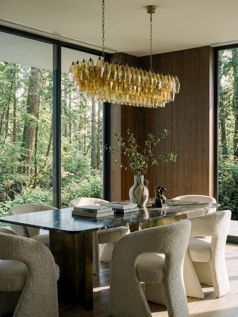 138 amber poliedri chandelier hanging in diningroom in house with a view