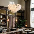 37 clear Murano glass chandelier hanging in a bar