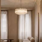 101 textured transparent Murano glass tube chandelier hanging in a livingroom