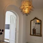 41 smoked felci glasses hanging in hall.